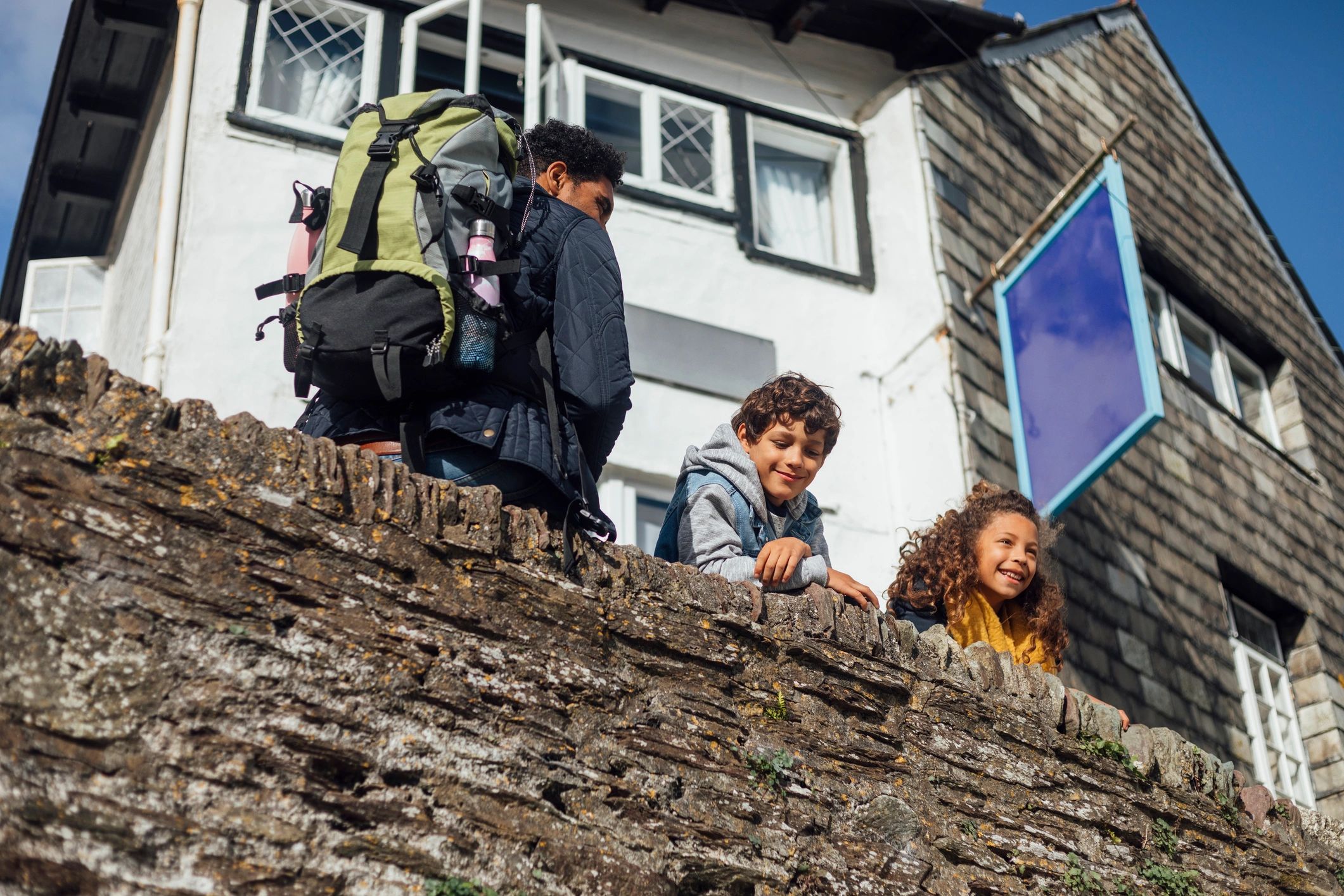 Family and children enjoying an outdoor learning experience