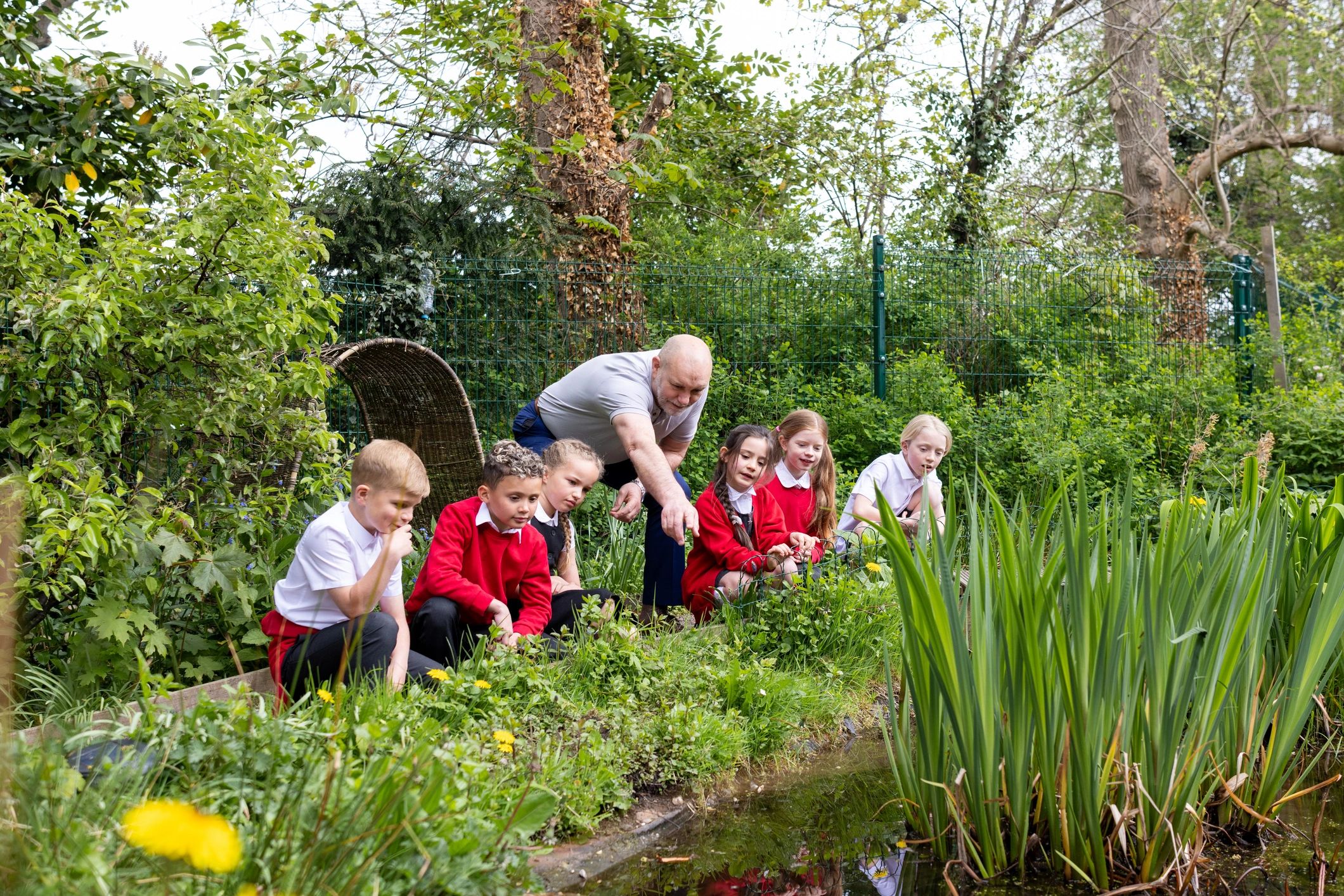Group learning together outdoors during an educational program