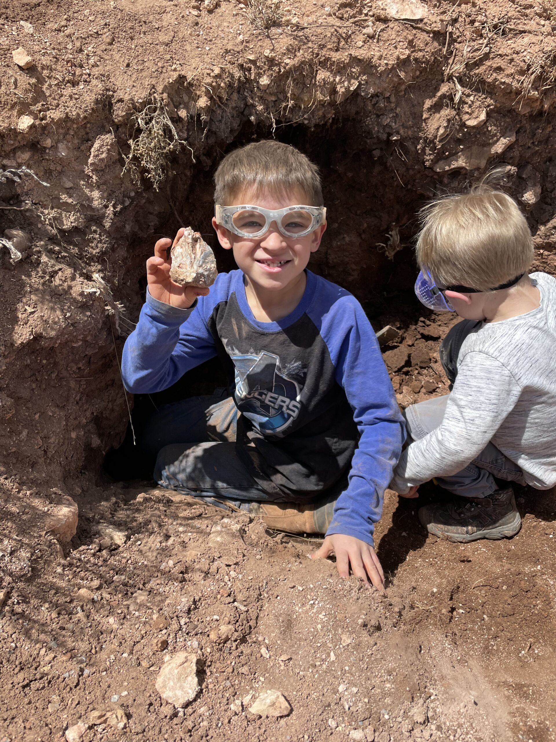 Participants digging for barite specimens